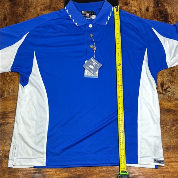pro celebrity Other - Sporty Blue and White Polo Shirt with Moisture-Wicking Fabric